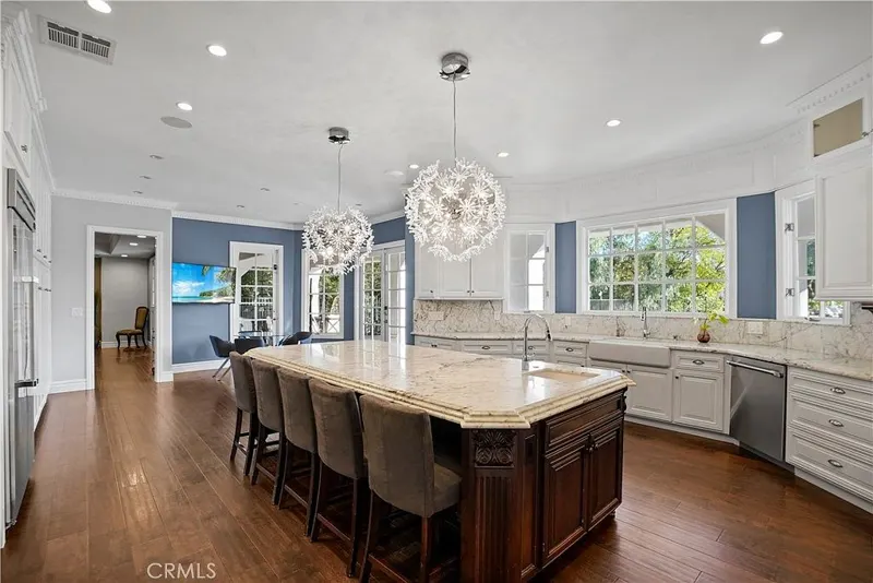 Kitchen seating island and breakfast area at One Zoom Listing