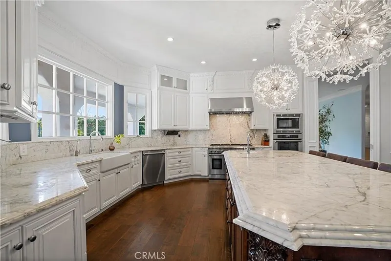Marble prep counters and professional appliances at One Zoom Listing