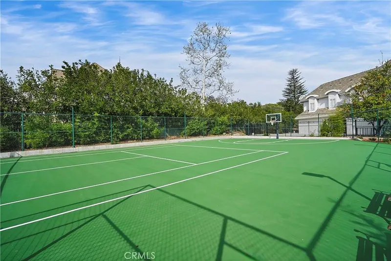 Full-size tennis and basketball court at One Zoom Listing