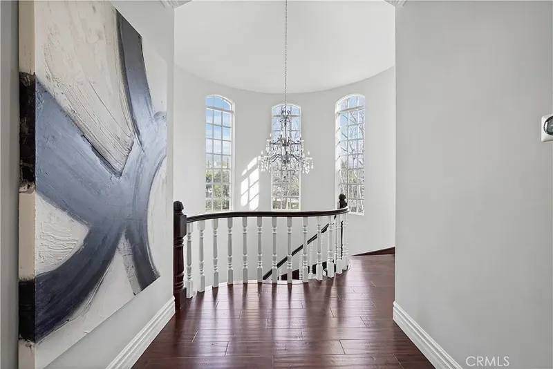 Upper landing above the foyer at One Zoom Listing